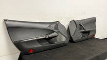Load image into Gallery viewer, 05 13 Corvette C6 Z06 Driver Passenger Interior Door Trim Panels Black Pair OEM