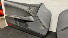 Load image into Gallery viewer, 05 13 Corvette C6 Z06 Driver Passenger Interior Door Trim Panels Black Pair OEM