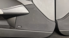 Load image into Gallery viewer, 05 13 Corvette C6 Driver Passenger Interior Door Trim Panels Black Pair OEM