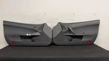 Load image into Gallery viewer, 05 13 Corvette C6 Driver Passenger Interior Door Trim Panels Black Pair OEM