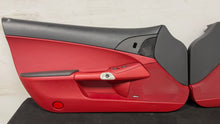 Load image into Gallery viewer, 05 13 Corvette C6 Driver Passenger Interior Door Trim Panels Black Red Pair OEM