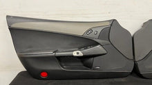 Load image into Gallery viewer, 05 13 Corvette C6 Z06 4LT Driver Passenger Interior Door Panels Black Pair Tan