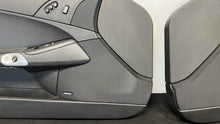 Load image into Gallery viewer, 05 13 Corvette C6 Z06 Driver Passenger Interior Door Trim Panels Black Pair