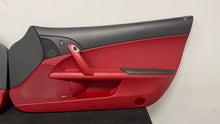 Load image into Gallery viewer, 05 13 Corvette C6 Driver Passenger Interior Door Trim Panels Black Red Pair OEM