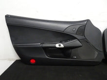 Load image into Gallery viewer, 05 13 Corvette C6 Driver Passenger Interior Door Trim Panels Black Pair OEM 56K