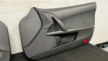 Load image into Gallery viewer, 05 13 Corvette C6 Z06 Driver Passenger Interior Door Trim Panels Black Pair OEM