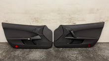 Load image into Gallery viewer, 05 13 Corvette C6 Driver Passenger Interior Door Trim Panels Black Pair OEM