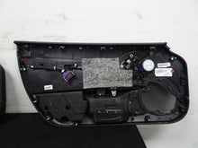 Load image into Gallery viewer, 05 13 Corvette C6 Driver Passenger Interior Door Trim Panels Black Pair OEM 56K