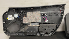 Load image into Gallery viewer, 05 13 Corvette C6 Driver Passenger Interior Door Trim Panels Black Pair OEM