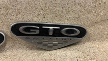 Load image into Gallery viewer, 2005 2006 Pontiac GTO Exterior Driver Passenger Fender Emblem Badge OEM 6.0L