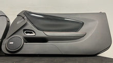 Load image into Gallery viewer, 10 15 Chevrolet Camaro SS Interior Right Left Door Panel Pair OEM Black Panels