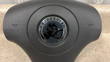 Load image into Gallery viewer, 2012 Corvette C6 Centennial Edition Driver Side SRS Left RARE Badge 22767453