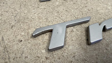 Load image into Gallery viewer, 93 02 Firebird Trans AM Factory Left Right Door Emblem Letters Silver GM RH LH