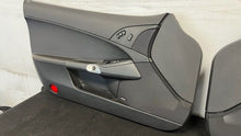 Load image into Gallery viewer, 05 13 Corvette C6 Z06 Driver Passenger Interior Door Trim Panels Black Pair
