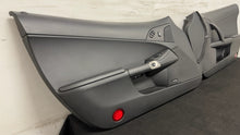 Load image into Gallery viewer, 05 13 Corvette C6 Driver Passenger Interior Door Trim Panels Black Pair OEM
