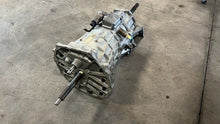 Load image into Gallery viewer, 97 04 C5 M12 Corvette T56 6 speed transmission Tremec OEM GM 27 Spline 1386-023
