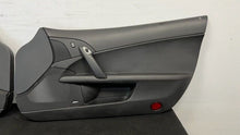 Load image into Gallery viewer, 05 13 Corvette C6 Z06 Driver Passenger Interior Door Trim Panels Black Pair
