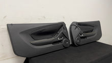 Load image into Gallery viewer, 10 15 Camaro SS Interior Right Left Door Panel Pair Yellow Stitching OEM GM 39K

