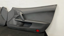 Load image into Gallery viewer, 05 13 Corvette C6 Z06 Driver Passenger Interior Door Trim Panels Black Pair
