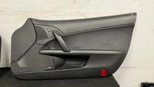 Load image into Gallery viewer, 05 13 Corvette C6 Z06 Driver Passenger Interior Door Trim Panels Black Pair OEM

