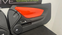 Load image into Gallery viewer, 10 15 Camaro SS Interior Right Left Door Panel Pair OEM Orange Panels 32K Miles
