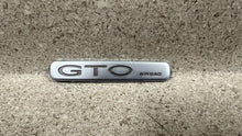 Load image into Gallery viewer, 04 05 06 Pontiac GTO Interior Dash Emblem Passenger OEM GM Badge
