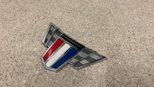 Load image into Gallery viewer, 2010 2015 CAMARO COMMEMORATIVE EDITION FRONT FENDER EMBLEM GM 23171889 USED
