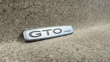 Load image into Gallery viewer, 04 05 06 Pontiac GTO Interior Dash Emblem Passenger OEM GM Badge
