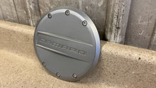Load image into Gallery viewer, 2010 2015 Camaro SS GM Fuel Gas Door in Satin Silver Molding Trim 92227783
