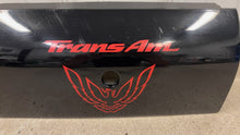 Load image into Gallery viewer, 93 02 Pontiac Firebird Trans AM Center Tail Light Filler Trim Panel GM 16516876
